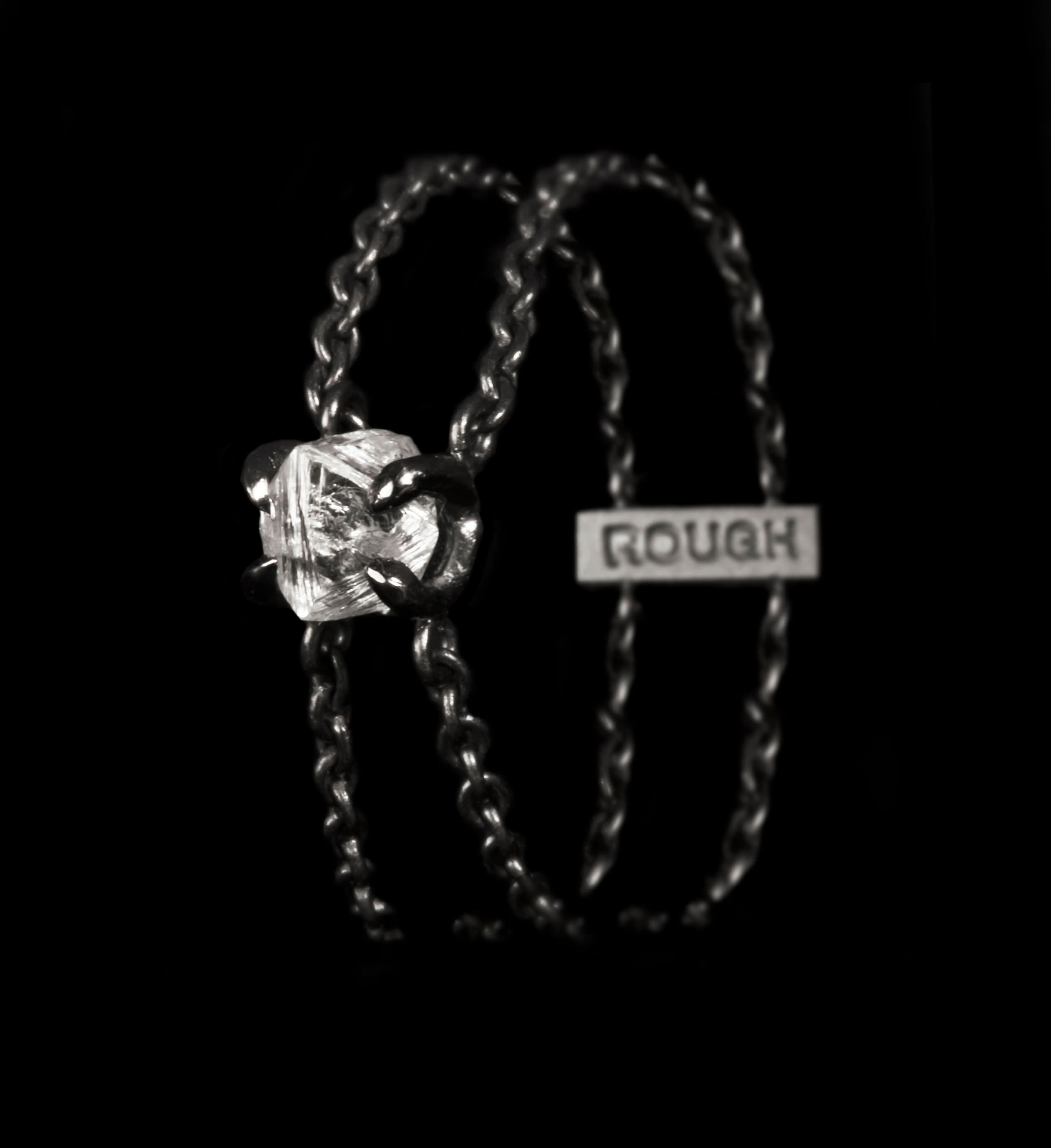 0.59 ct. Natural White rough diamond in a white gold chain-ring