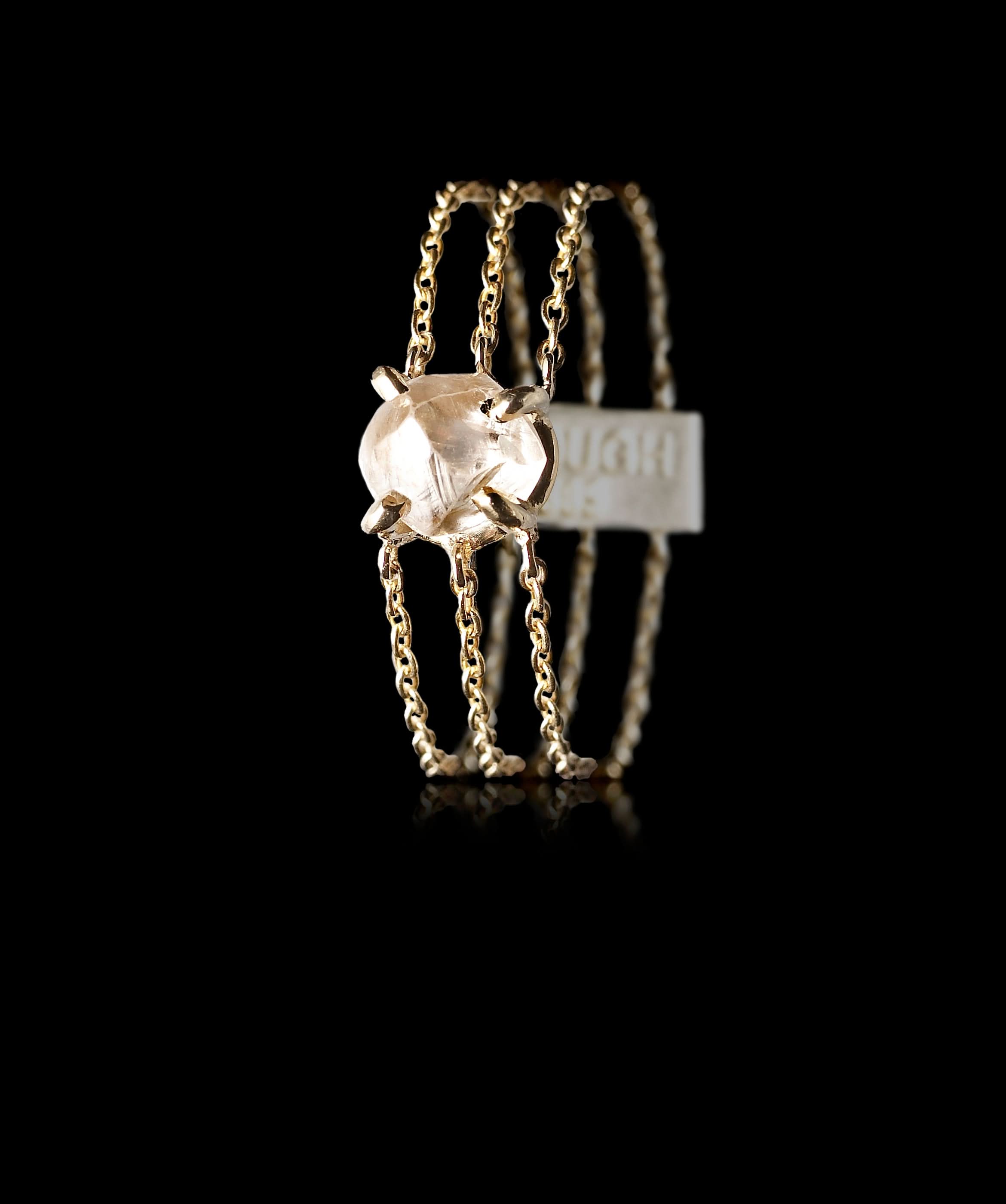 0.99 ct. Natural Rough Diamond in a gold chain-ring
