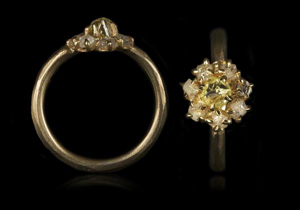 0.67 ct. Natural Fancy Yellow & 0.69 ct. Whitish Rough diamonds in 14K gold ring