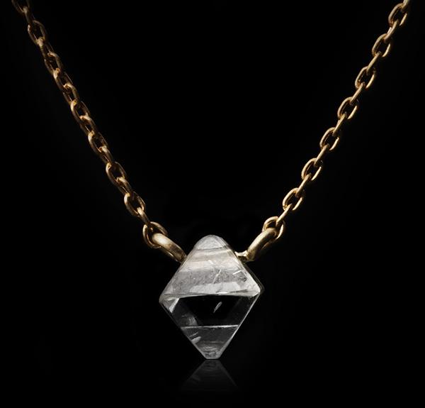 <strong>0.81 ct.</strong> Natural Octahedron Rough diamond in 18K gold necklace