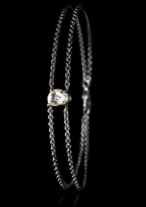 <strong>1.03 ct.</strong> Natural Rough diamond in 18K black rhodium white gold chain bracelet