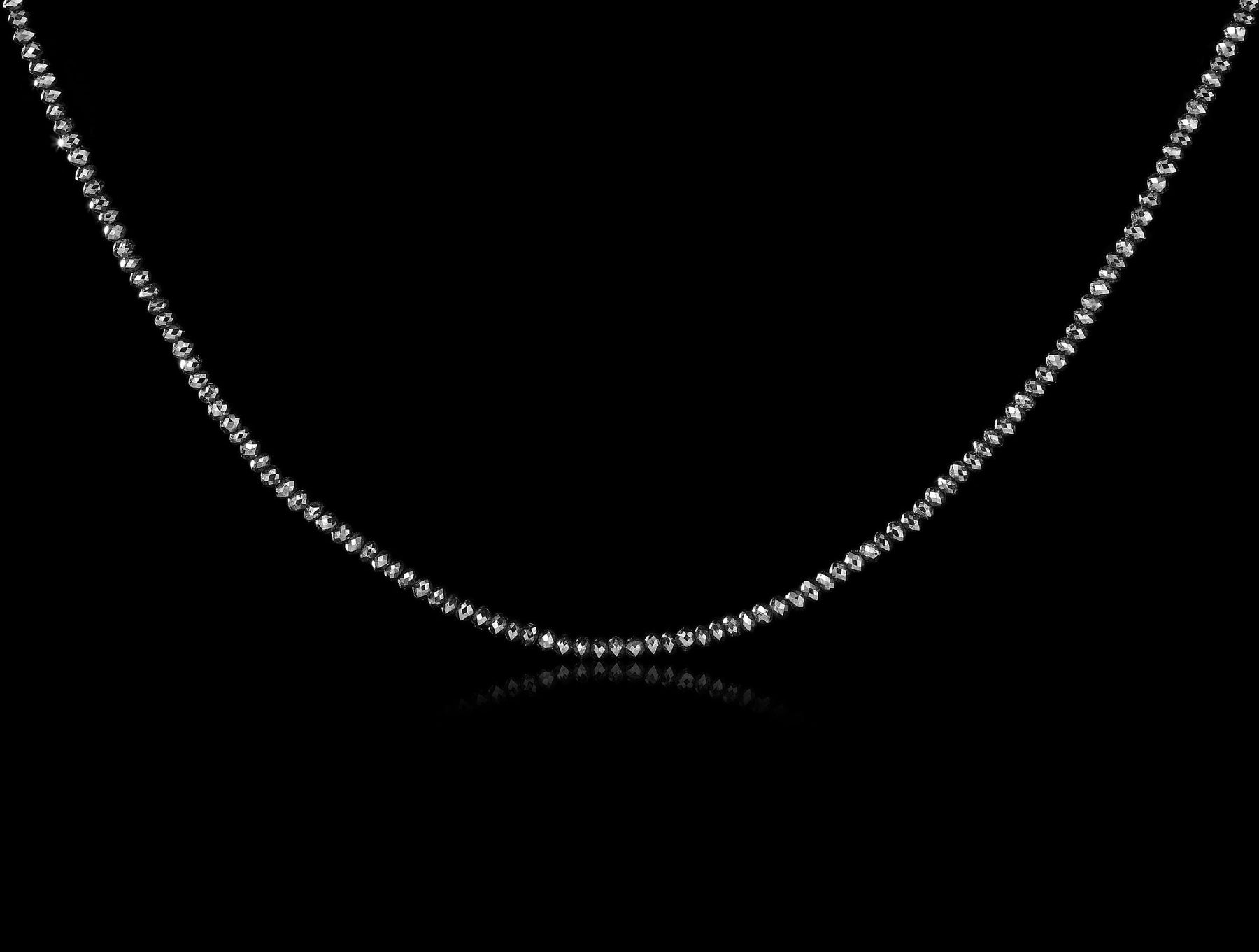 36.67 ct. - Sorte Facetterede Diamanter i en Collier