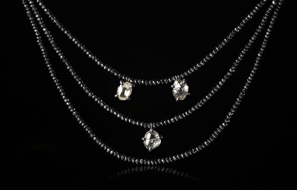 6.11 ct. Natural Rough diamonds & 48.28 ct. Black Facetted diamonds in a collier