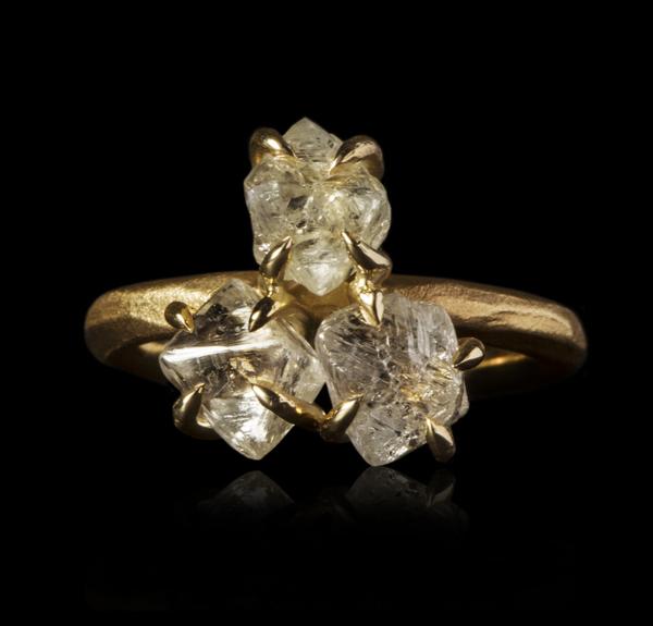 <strong>6.12 ct.</strong> Natural Whitish Rough diamonds in 14K gold ring