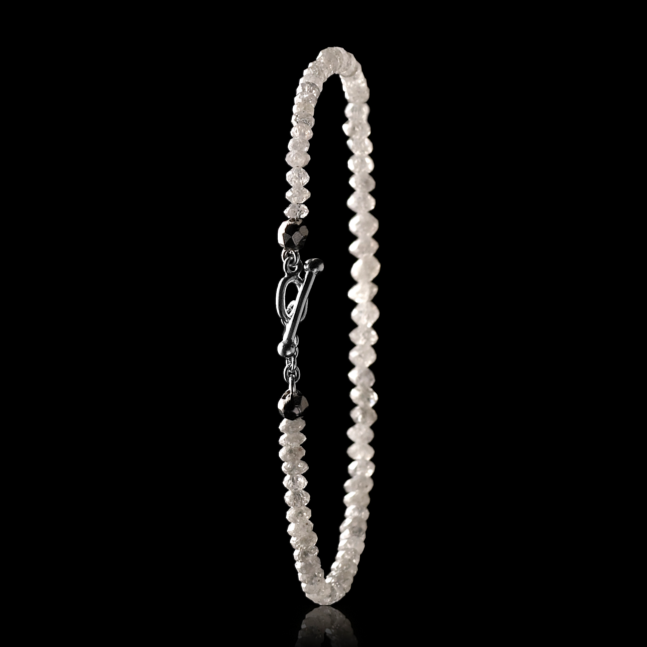 White Facetted diamonds in bracelet