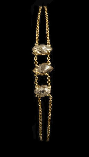 <strong>4.84 ct.</strong> Natural Rough diamonds in 18K gold chain bracelet